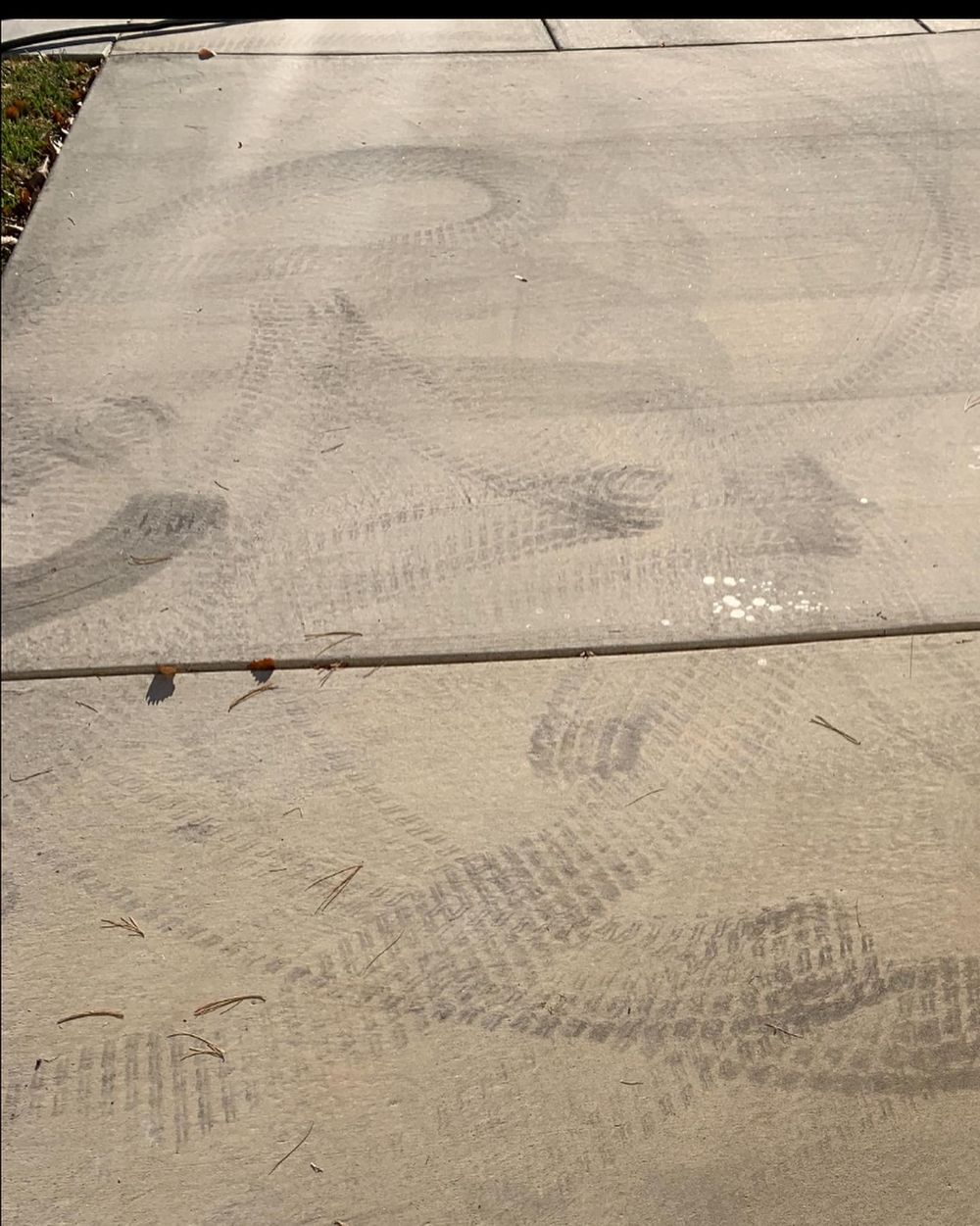 Tire tracks removal on concrete driveway in greeneville tn